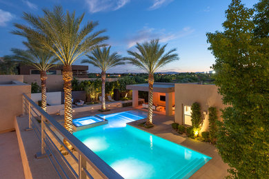 Design ideas for a large contemporary pool in Las Vegas.