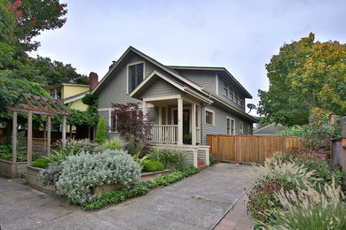 Inspiration for a craftsman wood exterior home remodel in Portland