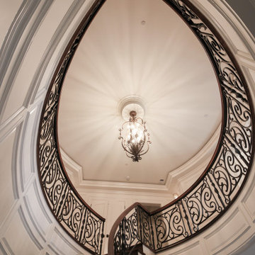 Project #74 | Circular Staircase with Hand-Forged Metal Panels