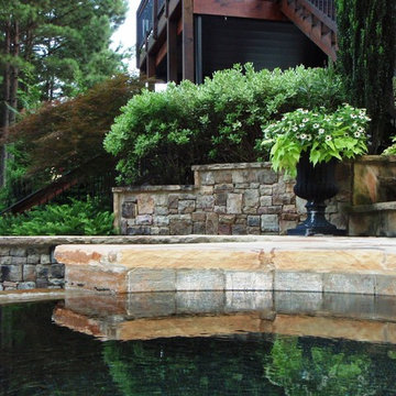 Suburban Backyard Retreat by Lawns by Hand, Inc.