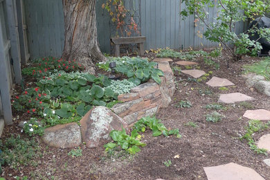 Inspiration for a rustic landscaping in Denver.