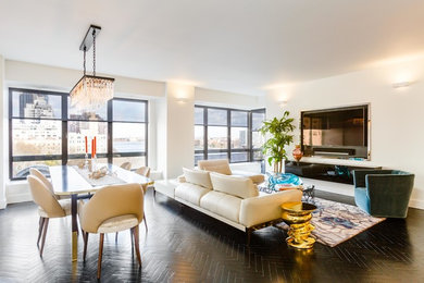 Inspiration for a mid-sized contemporary loft-style dark wood floor living room remodel in New York with white walls and a wall-mounted tv