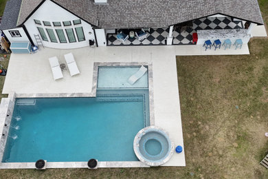 Inspiration for a modern backyard rectangular pool remodel in Houston
