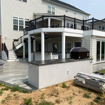 Basement, deck and outdoor kitchen in Ellicott City