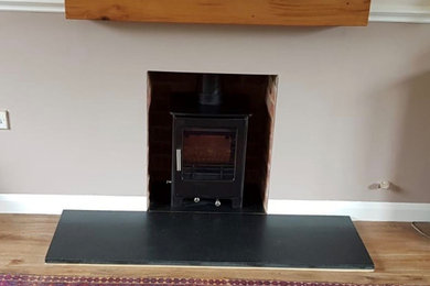 Log burner and beam