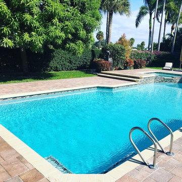 Boca Remodel, New pool finish, tile,coping, and sun shelf