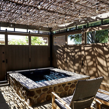 Ozegna Vineyards ResidenceOutdoor spa with sliding privacy panels in closed posi