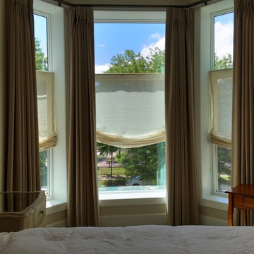 Velvet Blackout Drapes over Linen Relaxed Roman Shades