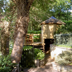 "...treehouse and deck set into garden" - Garden Playhouses