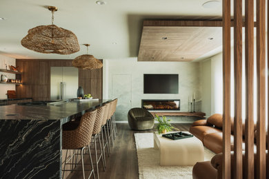 Example of a mid-sized trendy open concept dark wood floor, brown floor, wood ceiling and wallpaper living room design in San Francisco with beige walls, a ribbon fireplace and a wall-mounted tv