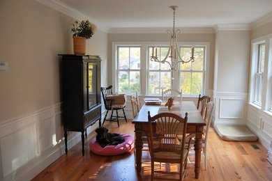 Example of an eclectic dining room design in Boston