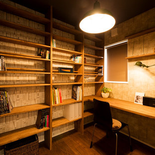 Inspiration for a retro home office and library in Other.