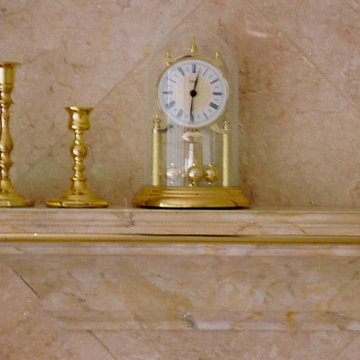 Faux marble mantelpiece to match real marble (behind)