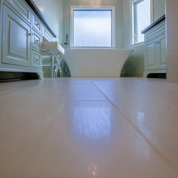 Low Angle - tub view and cabinets.