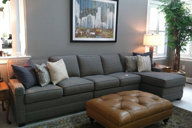 Inspiration for a mid-sized transitional open concept carpeted and white floor family room remodel in Philadelphia with gray walls