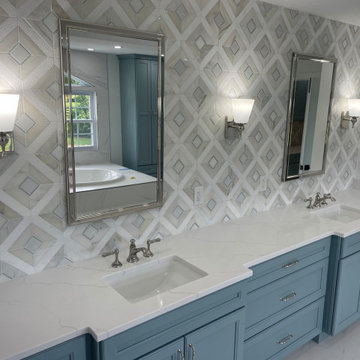 Master Bathroom Remodeling in Purcellville with Drop-in Tub and Blue Cabinets
