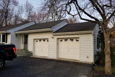 Photo of a mid-sized traditional garage in New York.