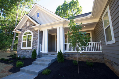 Large transitional gray one-story mixed siding house exterior idea in Richmond with a clipped gable roof and a shingle roof