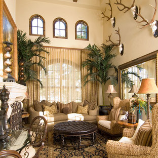 Design ideas for a large mediterranean mezzanine living room in Other with beige walls and a standard fireplace.