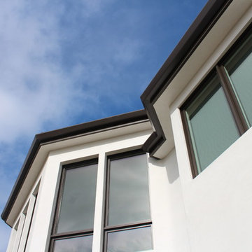 6 inch Angle Face/Flat Face Gutters with smooth Downspouts in Pacific Palisades