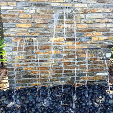 Custom water feature with 3 water descents