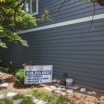 Shiny new Andersen Windows, Evening Blue James Hardie siding & stone accents