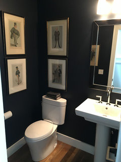 Navy blue walls in bathroom, what accent colors?