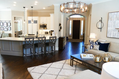 Mid-sized transitional open concept dark wood floor and brown floor living room photo in Other with white walls, a standard fireplace and a stone fireplace