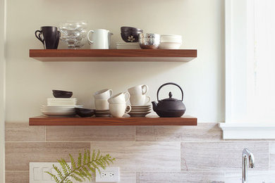 Kitchen - small contemporary kitchen idea in San Francisco with open cabinets, quartz countertops, medium tone wood cabinets, gray backsplash, stainless steel appliances, no island and travertine backsplash