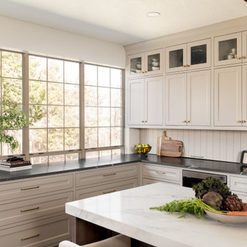 Painted Inset Cabinetry and Leathered Granite in a Transitional Edmond Kitchen