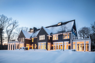 Inspiration for a country gray two-story gable roof remodel in New York