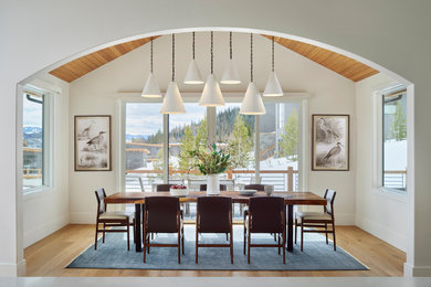 Dining room - rustic dining room idea in Denver