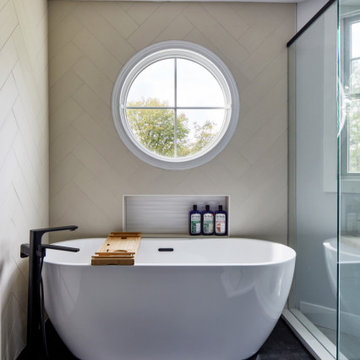 Luxury Tub Surrounded by Custom Glass Enclosure