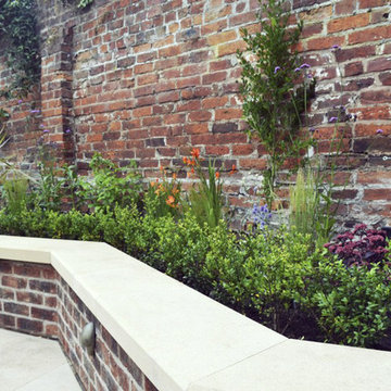 Stone/ brick etc landscape elements.
