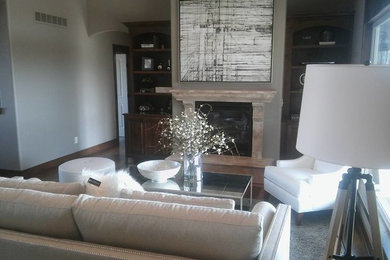Example of a mid-sized transitional open concept living room design in Wichita with a standard fireplace and a stone fireplace