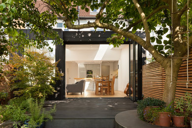 This is an example of a mid-sized contemporary home design in London.