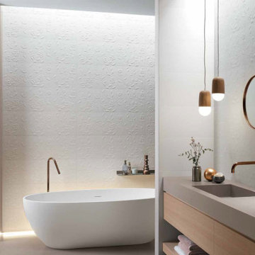 Modern white bathroom with subtle white porcelain tile