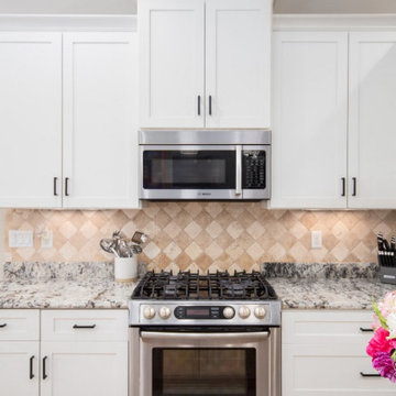 Kitchen Remodel Done with Cabinet Refacing in a Two-Tone Color