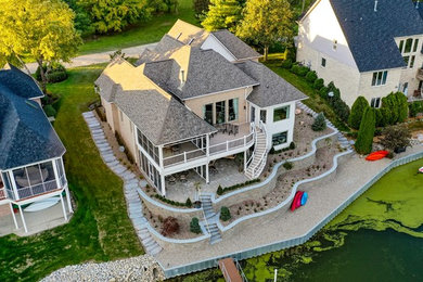 Large transitional two-story house exterior idea in Indianapolis