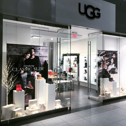 White Laminate Pedestals in UGG Retail Window - Products