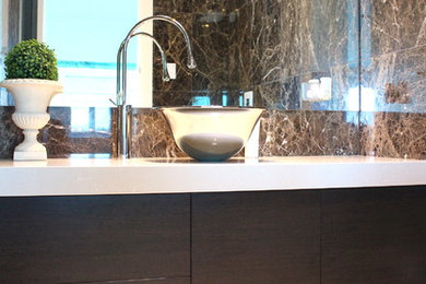 Design ideas for a modern bathroom in Sydney with quartzite benchtops.