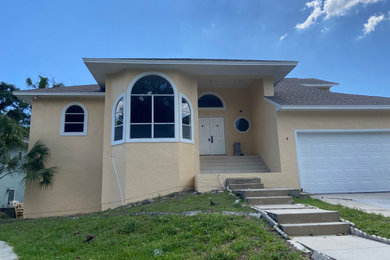 Inspiration for a huge contemporary exterior home remodel in Orlando