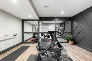 Example of a transitional multiuse home gym design in Boston
