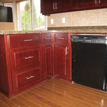 Modern Kitchen Remodel Done In a Cherry Veneer and Burgundy Stain
