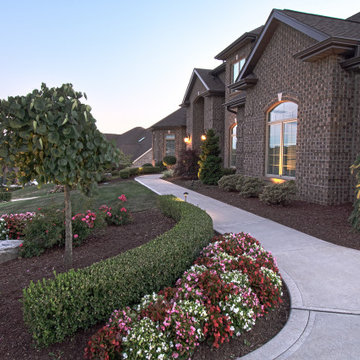 Custom Backyard with Pool House in Penn Trafford