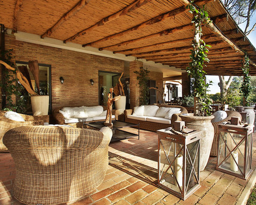 Foto e idee per verande veranda in campagna for Idee per arredare casa classica
