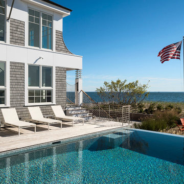seaside glass tile vanishing edge infinity swimming pool + spa