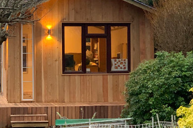 A bespoke cabin with an apex roof and clad in larch size 6x4m