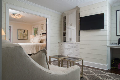 Photo of a traditional master bedroom in Other with white walls and dark hardwood floors.