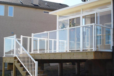 Photo of an arts and crafts sunroom in Providence.